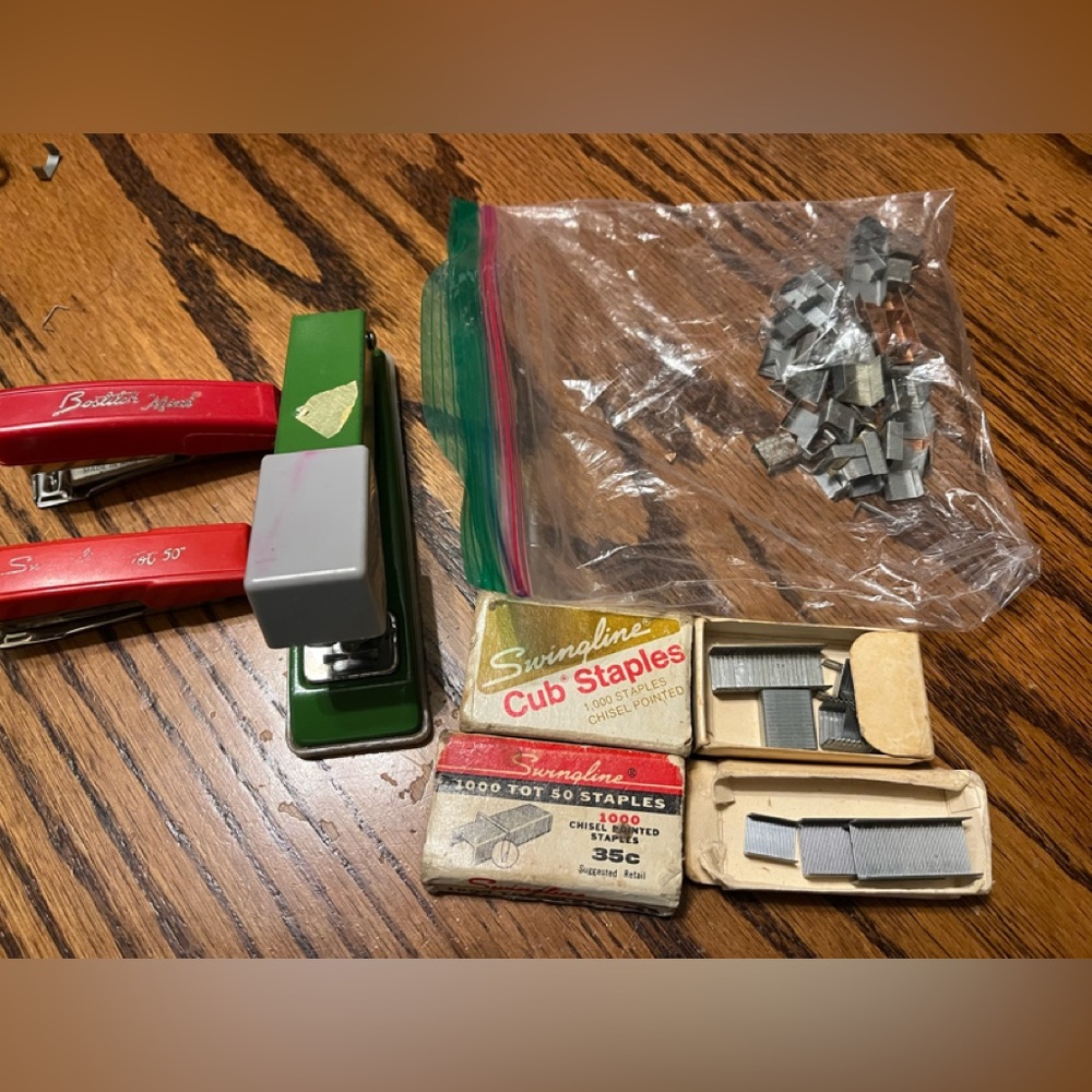 Three vintage working staplers and miscellaneous Staples